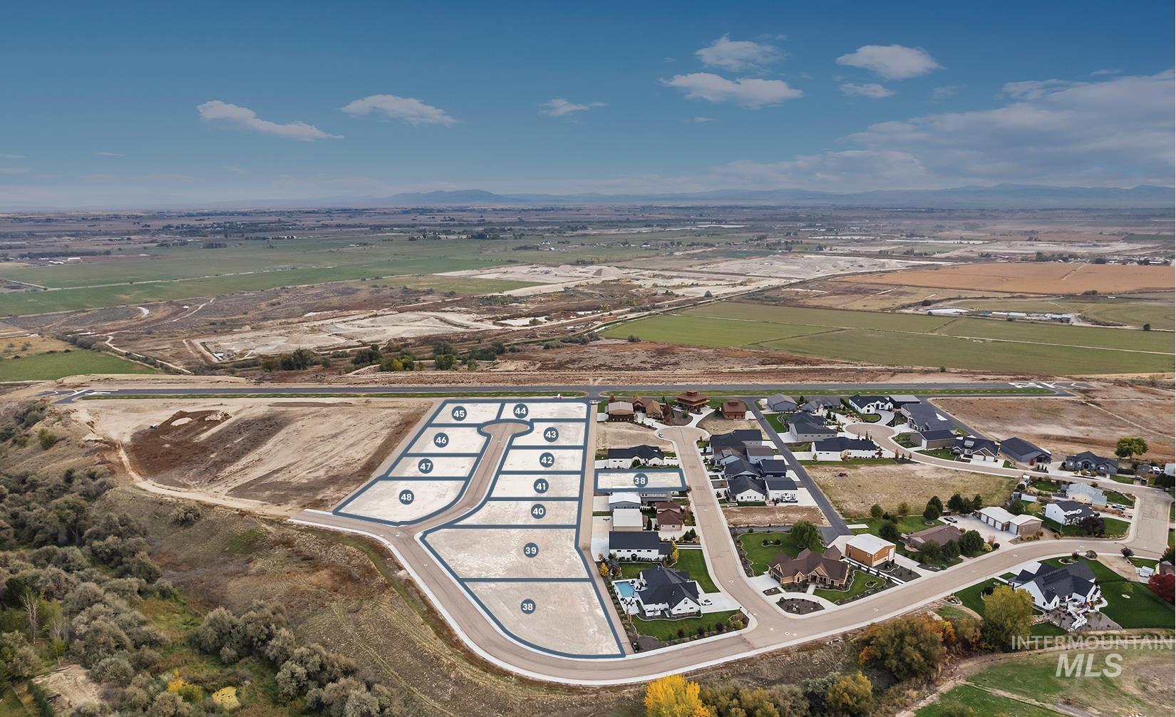 21313 Beechcraft Circle Greenleaf, ID 83626 - Photo 1 of 10 Aerial view of property and surrounding area with nearby suburban area
