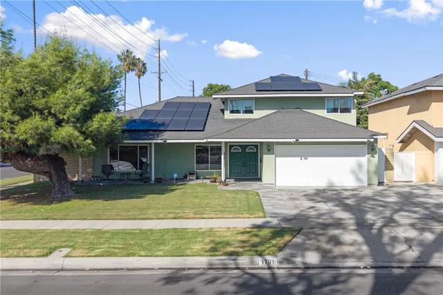 a view of a house with a swimming pool