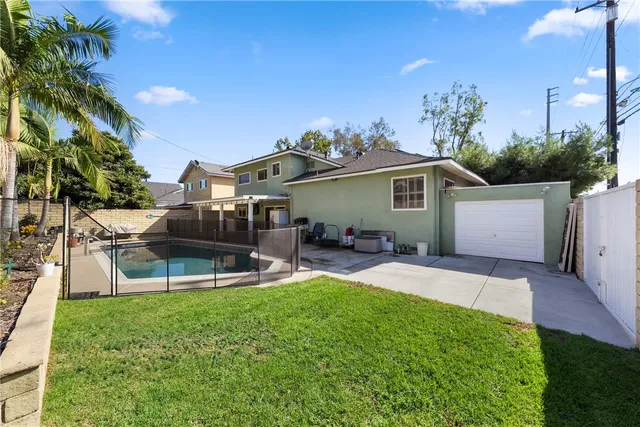 a view of a swimming pool with a patio