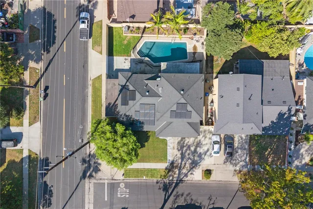 an aerial view of a house with a garden