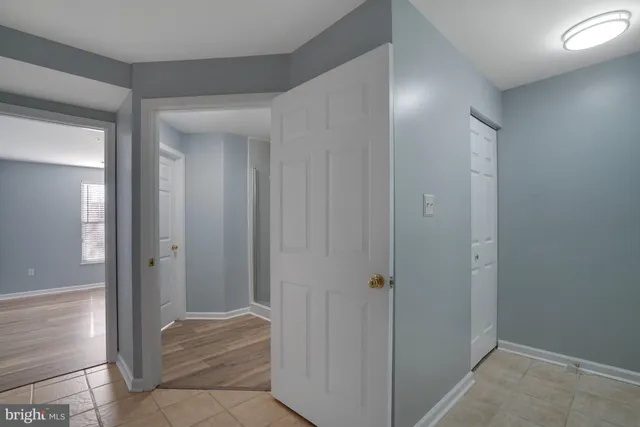a bathroom with a toilet a sink and shower