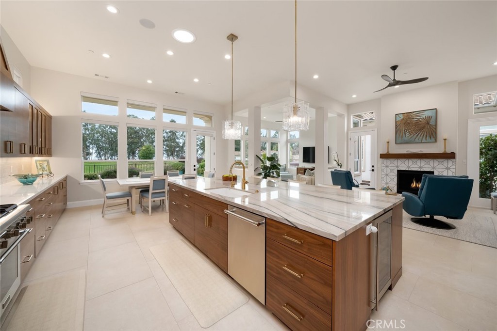 1988 Eucalyptus Road Nipomo, CA 93444 - Photo 12 of 63 a large kitchen with kitchen island a large island in it
