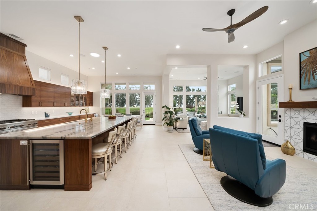 1988 Eucalyptus Road Nipomo, CA 93444 - Photo 13 of 63 a large kitchen with a large counter top space a sink stainless steel appliances and cabinets