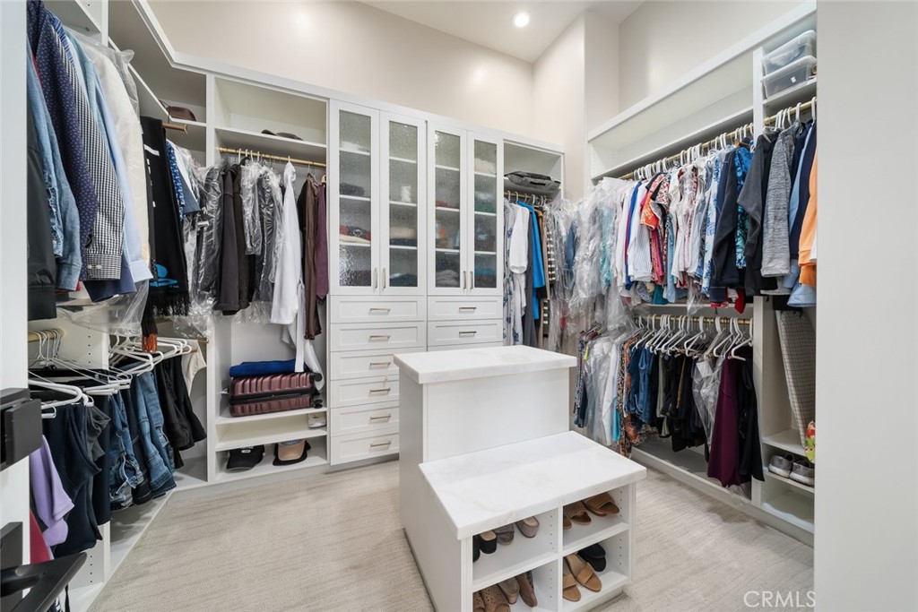 1988 Eucalyptus Road Nipomo, CA 93444 - Photo 36 of 63 a view of walk in closet with clothes and shoes
