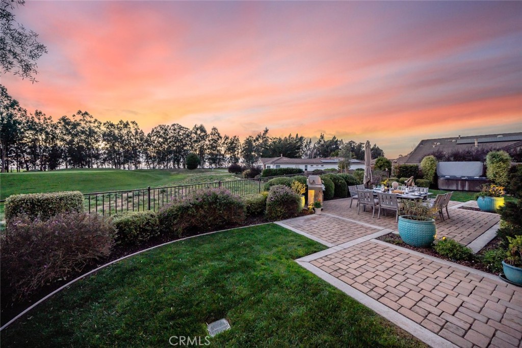 1988 Eucalyptus Road Nipomo, CA 93444 - Photo 48 of 63 a view of a backyard and couches under an umbrella
