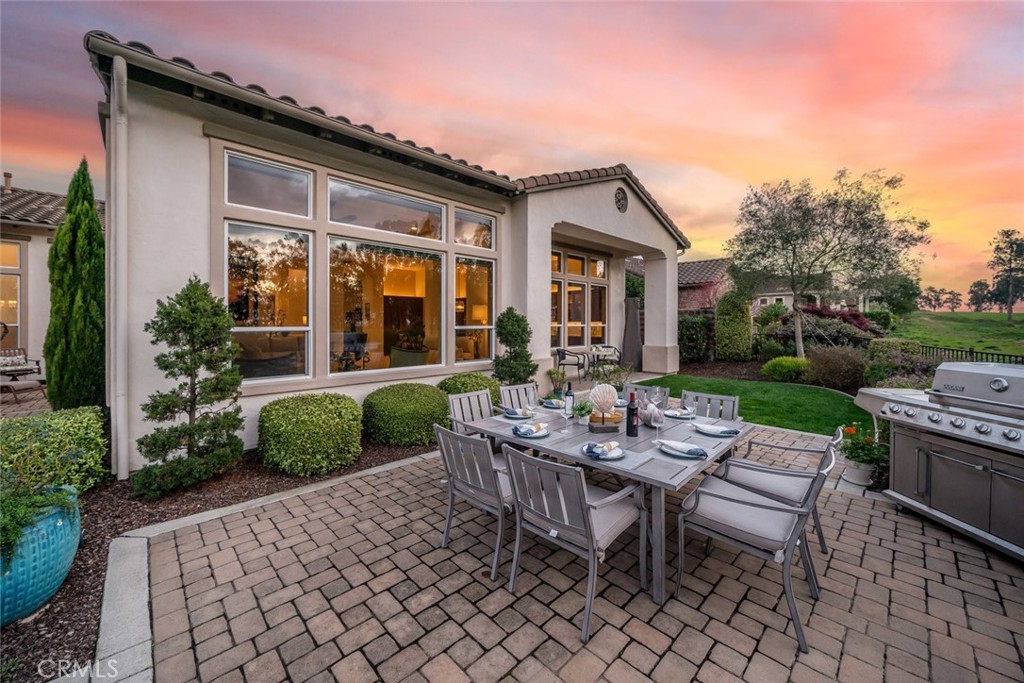1988 Eucalyptus Road Nipomo, CA 93444 - Photo 50 of 63 a view of a house with backyard sitting area and garden