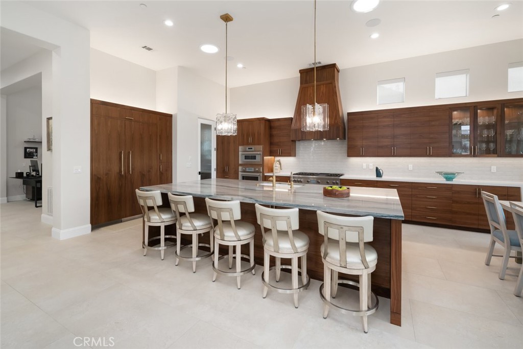 1988 Eucalyptus Road Nipomo, CA 93444 - Photo 6 of 63 a kitchen with a table and chairs