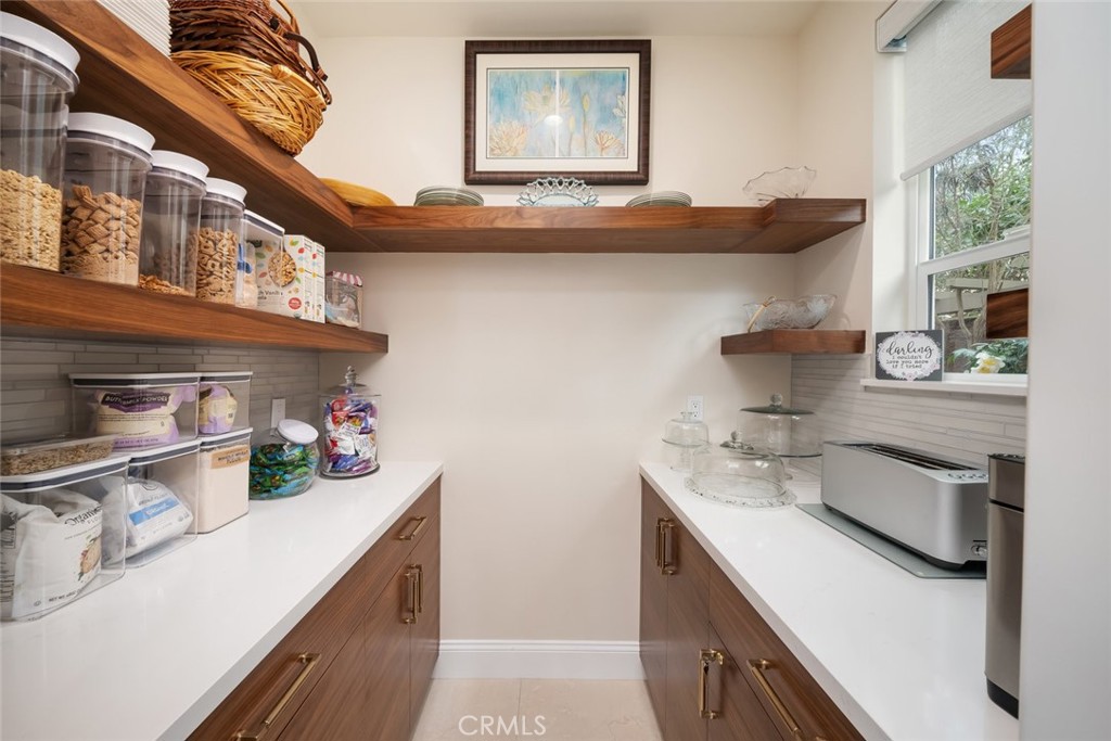 1988 Eucalyptus Road Nipomo, CA 93444 - Photo 10 of 63 a kitchen with a sink and a cabinets