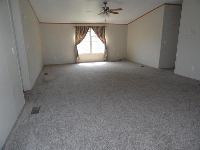 1512 McCauley Road Baker, FL 32531 - Photo 2 of 18 an empty room with a window