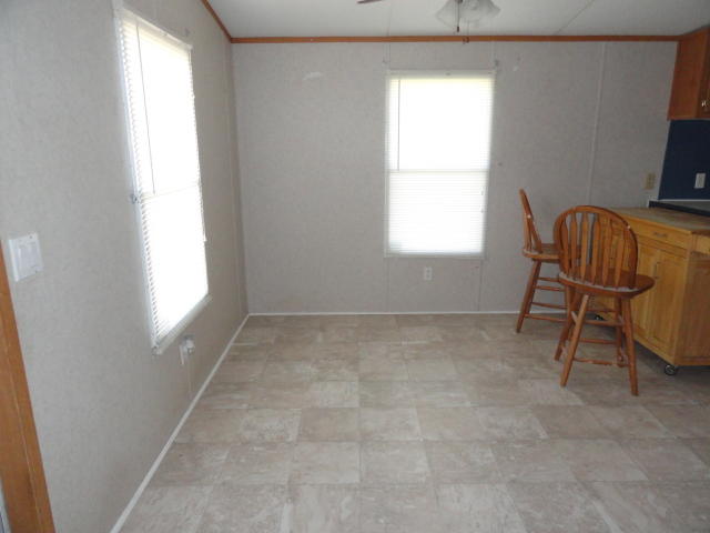 1512 McCauley Road Baker, FL 32531 - Photo 8 of 18 a view of room with window and furniture