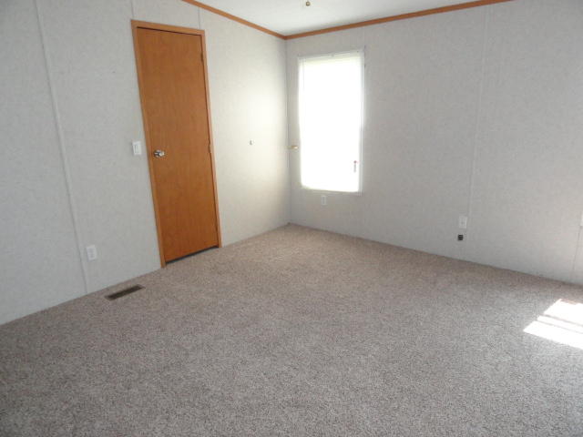 1512 McCauley Road Baker, FL 32531 - Photo 9 of 18 an empty room with windows