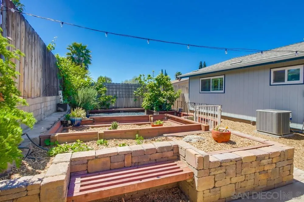 13409 Utopia Road Poway, CA 92064 - Photo 13 of 37 a view of a house with backyard and sitting area