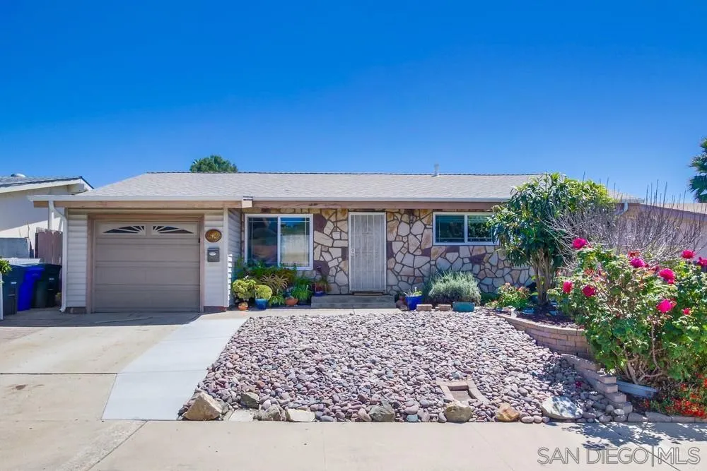 13409 Utopia Road Poway, CA 92064 - Photo 2 of 37 a front view of a house with garden
