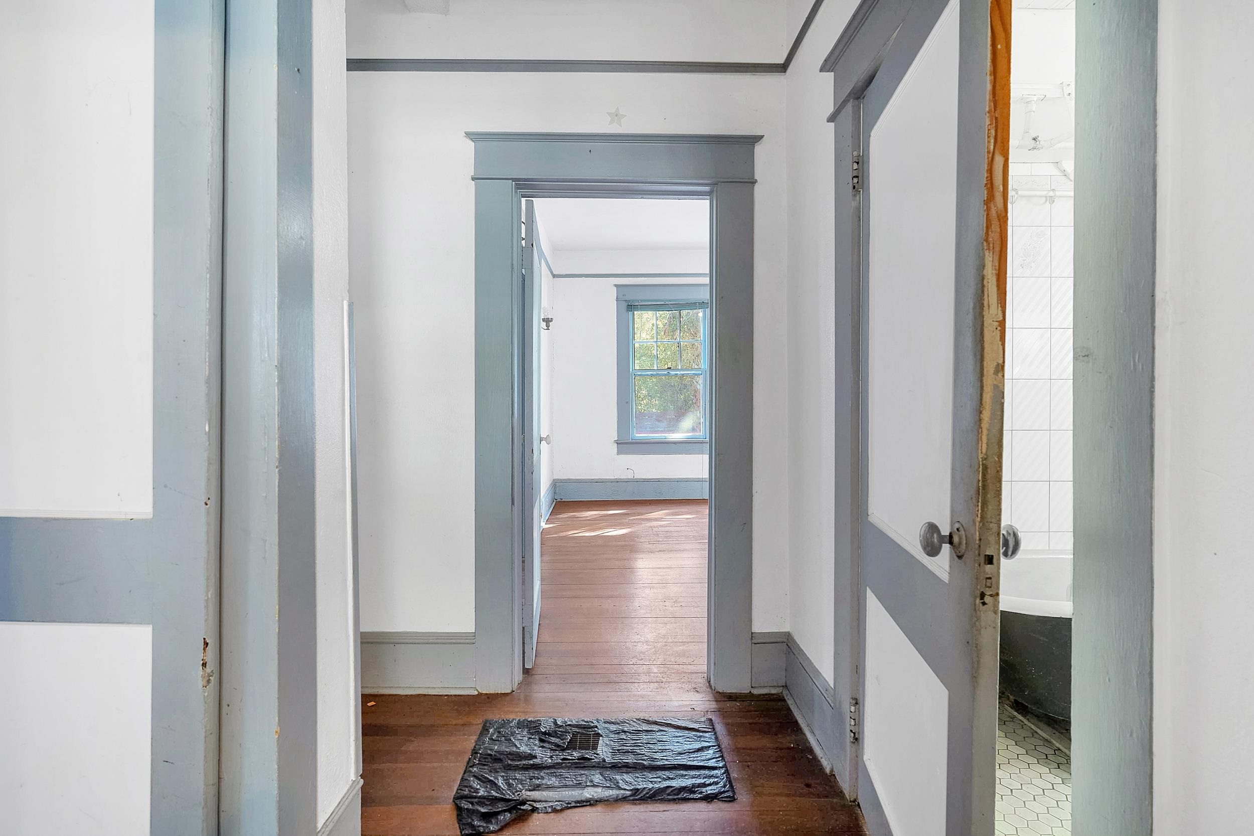134 Washington Street St. Augustine, FL 32084 - Photo 12 of 41 Corridor featuring wood finished floors