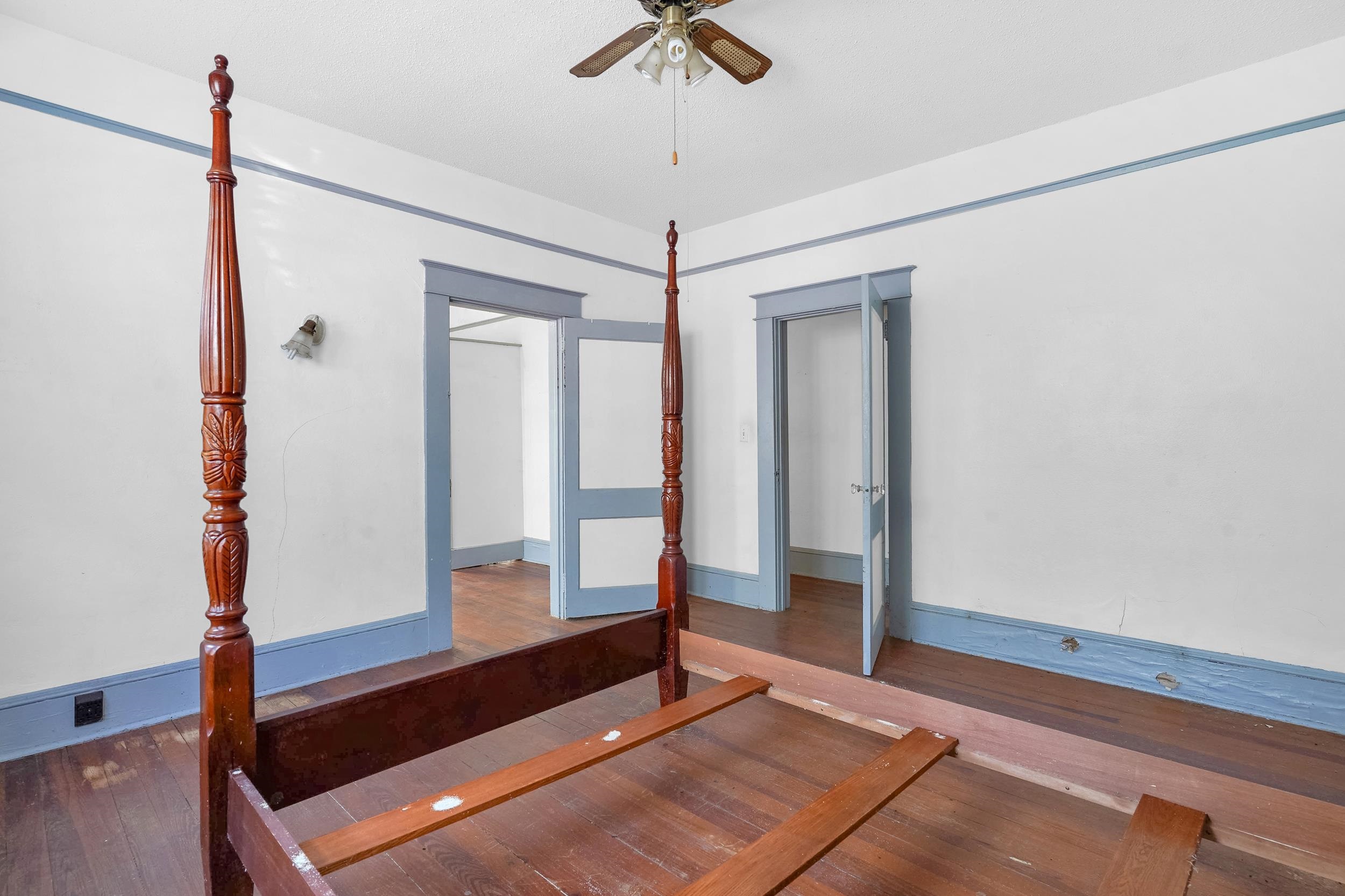 134 Washington Street St. Augustine, FL 32084 - Photo 15 of 41 a room with two bunk beds and a chandelier