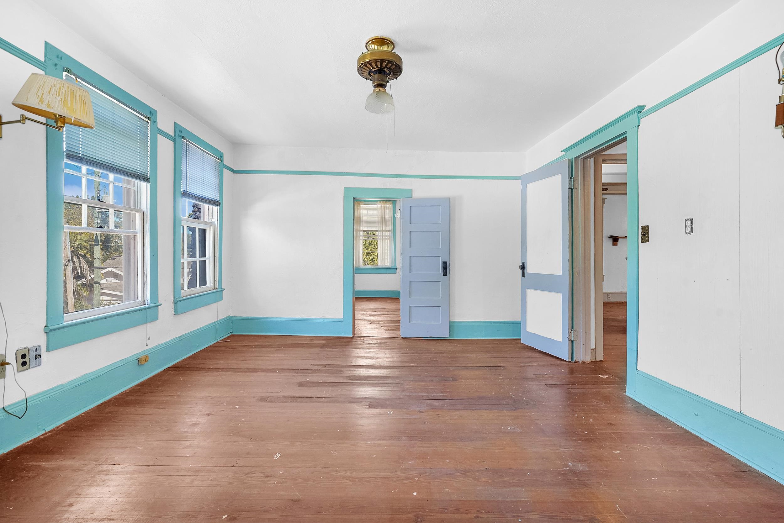 134 Washington Street St. Augustine, FL 32084 - Photo 26 of 41 a view of an empty room with window and cabinet