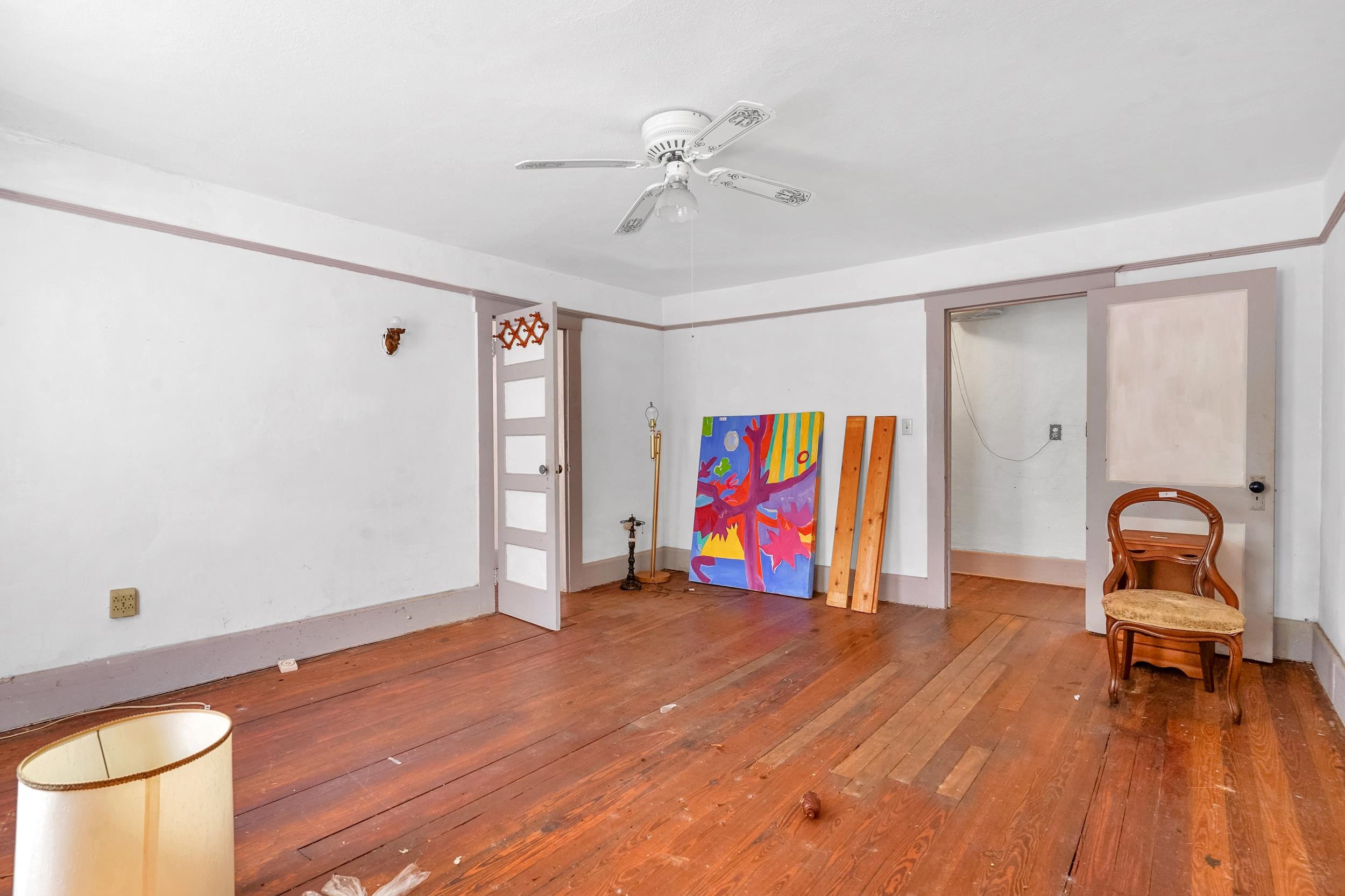 134 Washington Street St. Augustine, FL 32084 - Photo 32 of 41 Unfurnished room featuring wood-type flooring and ceiling fan