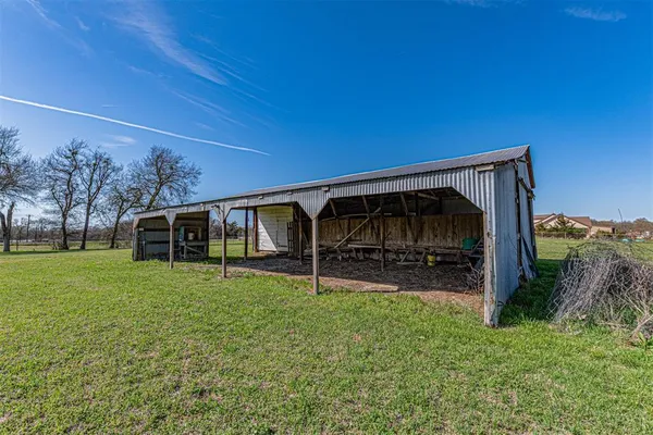 a view of swimming pool from a balcony