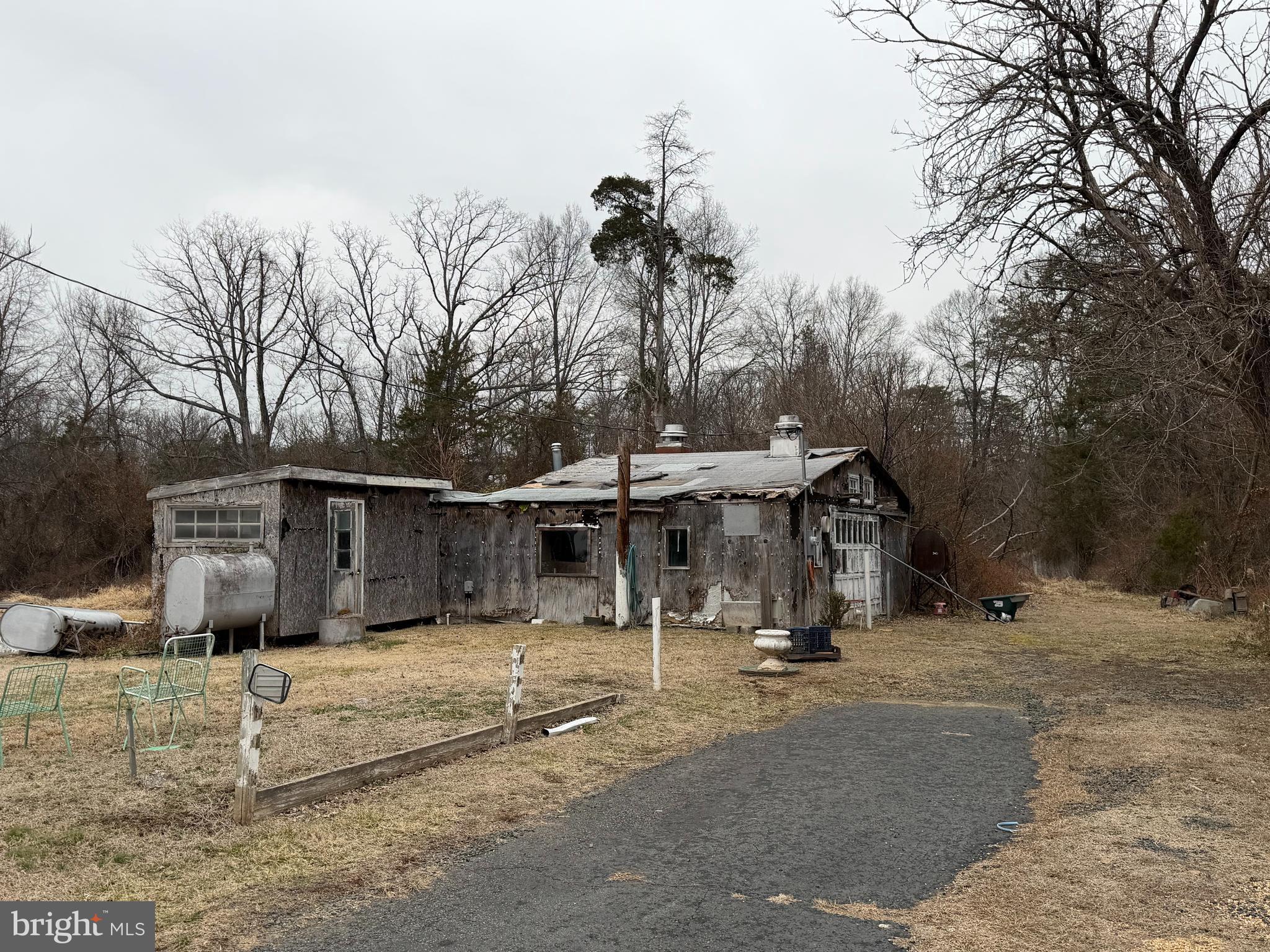 9163 Old Dumfries Road Catlett, VA 20119 - Photo 8 of 8 a view of a house with snow on the road