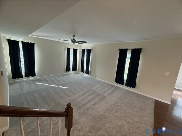 a view of staircase and hallway