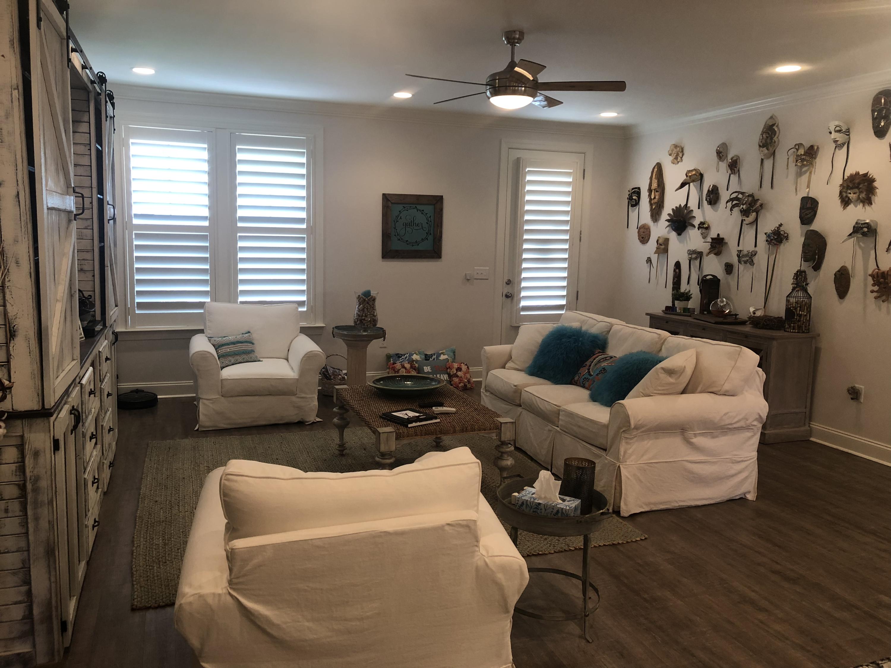 22 North Zander Way Santa Rosa Beach, FL 32459 - Photo 5 of 38 a living room with furniture and a large window