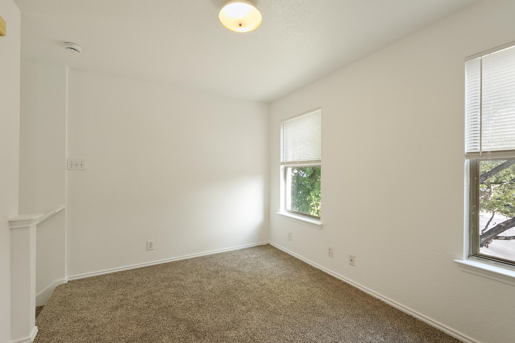 200 Lexington Kyle, TX 78640 - Photo 12 of 25 Carpeted empty room featuring baseboards