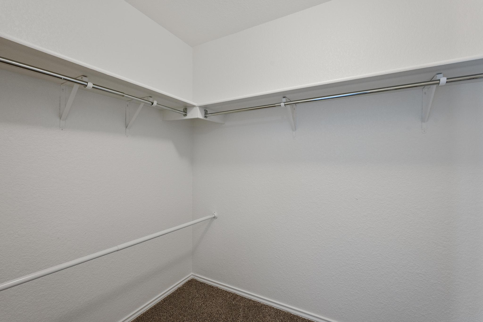 200 Lexington Kyle, TX 78640 - Photo 15 of 25 Walk in closet with dark carpet