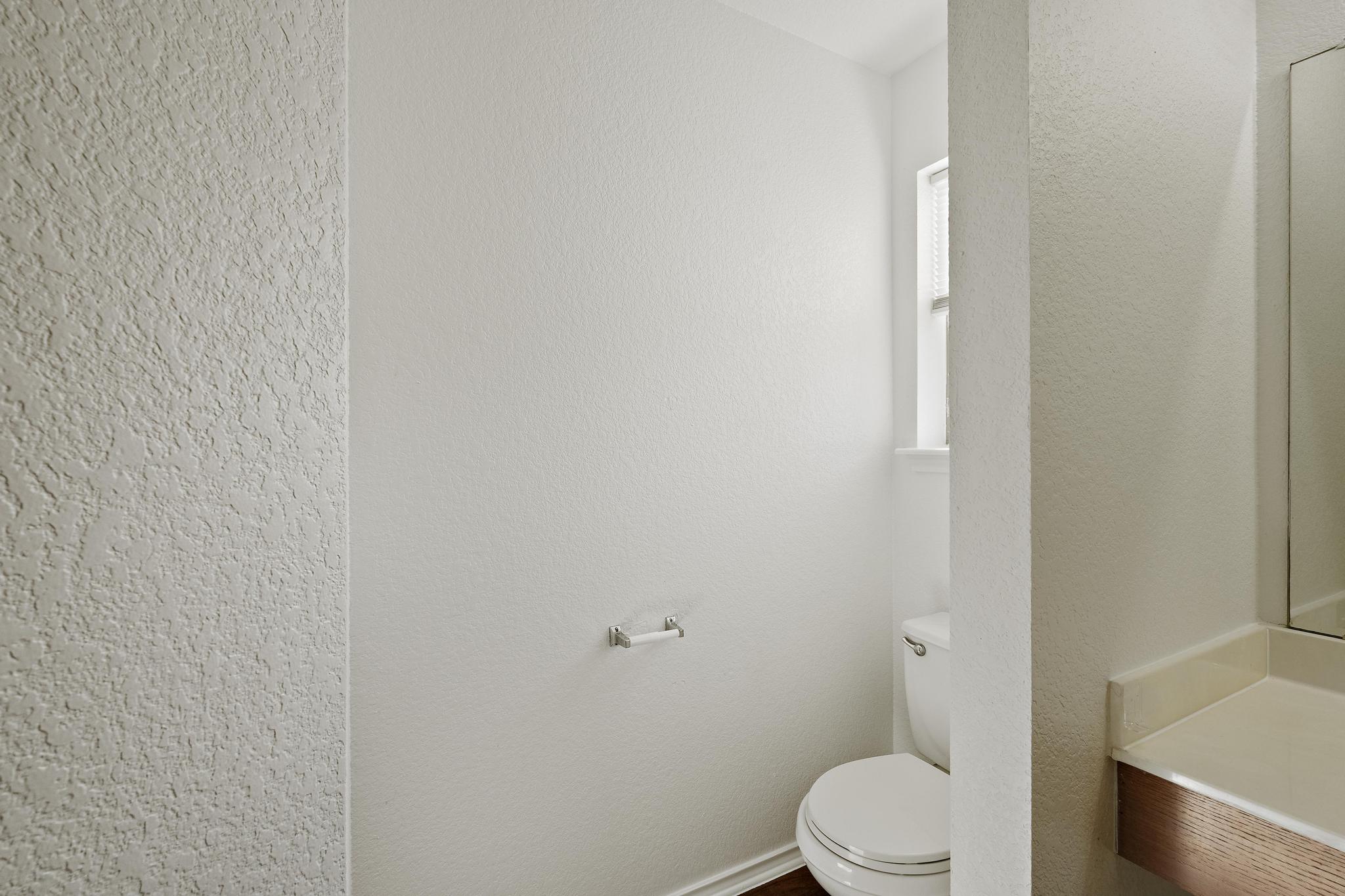 200 Lexington Kyle, TX 78640 - Photo 17 of 25 Bathroom featuring a textured wall