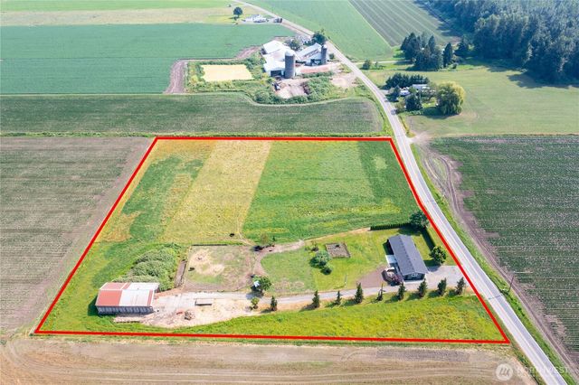 a view of swimming pool with a yard