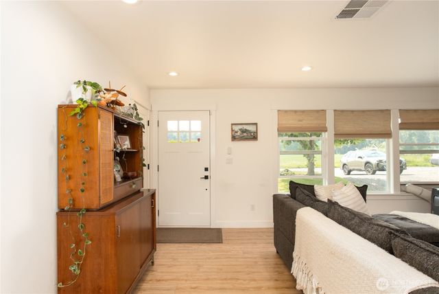 a very nice looking room with a large window