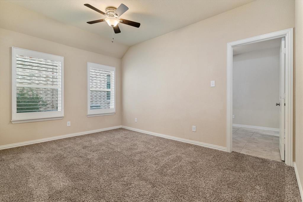 2413 Austin Lane Prosper, TX 75078 - Photo 17 of 32 a view of an empty room with a window