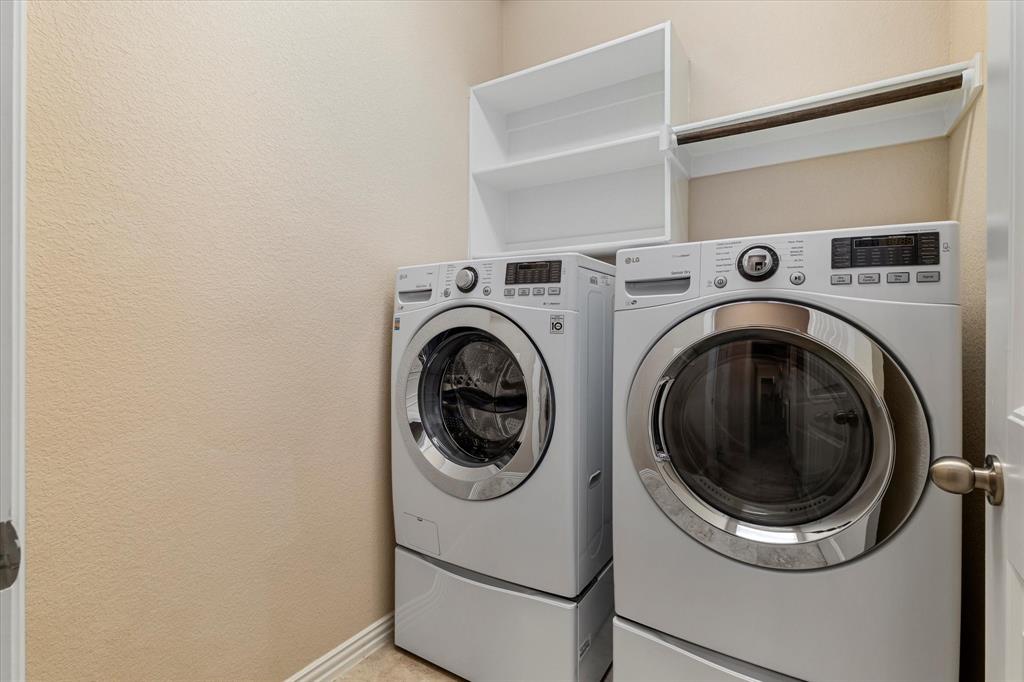 2413 Austin Lane Prosper, TX 75078 - Photo 22 of 32 a utility room with dryer and washer