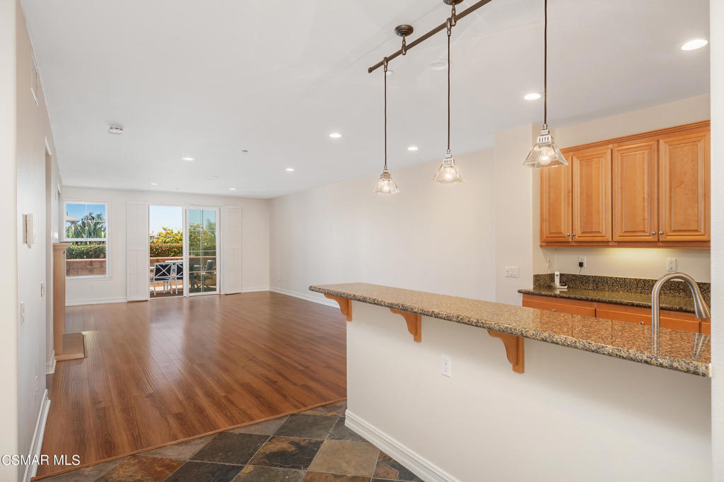 1415 Windshore Way Oxnard, CA 93035 - Photo 15 of 61 a view of a kitchen with a sink and cabinets