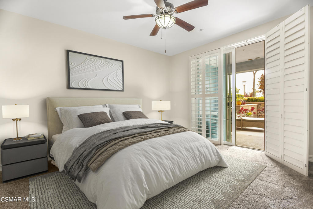 1415 Windshore Way Oxnard, CA 93035 - Photo 31 of 61 a bedroom with bed and two large window