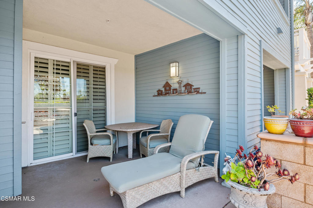 1415 Windshore Way Oxnard, CA 93035 - Photo 46 of 61 a view of a dining room with furniture and a window