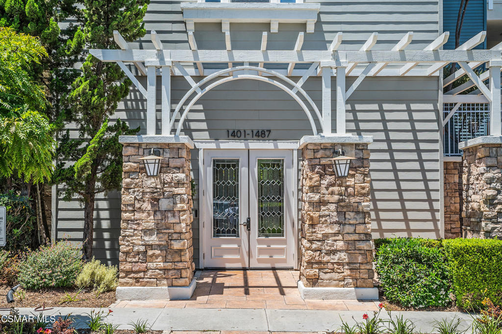 1415 Windshore Way Oxnard, CA 93035 - Photo 5 of 61 a large building with a clock on it