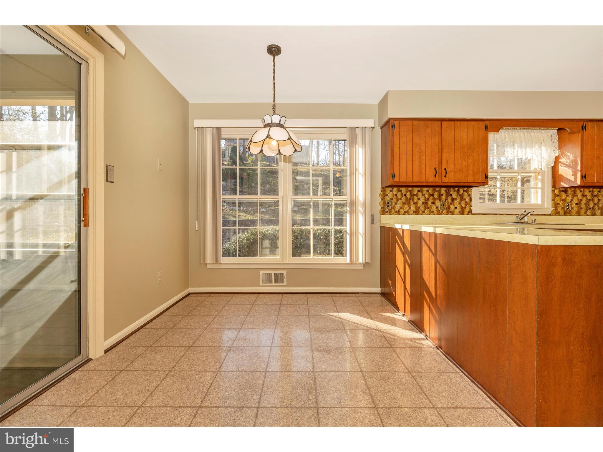 9517 Emory Grove Road Gaithersburg, MD 20877 - Photo 12 of 62 Bright eat-in Kitchen with a view of the back