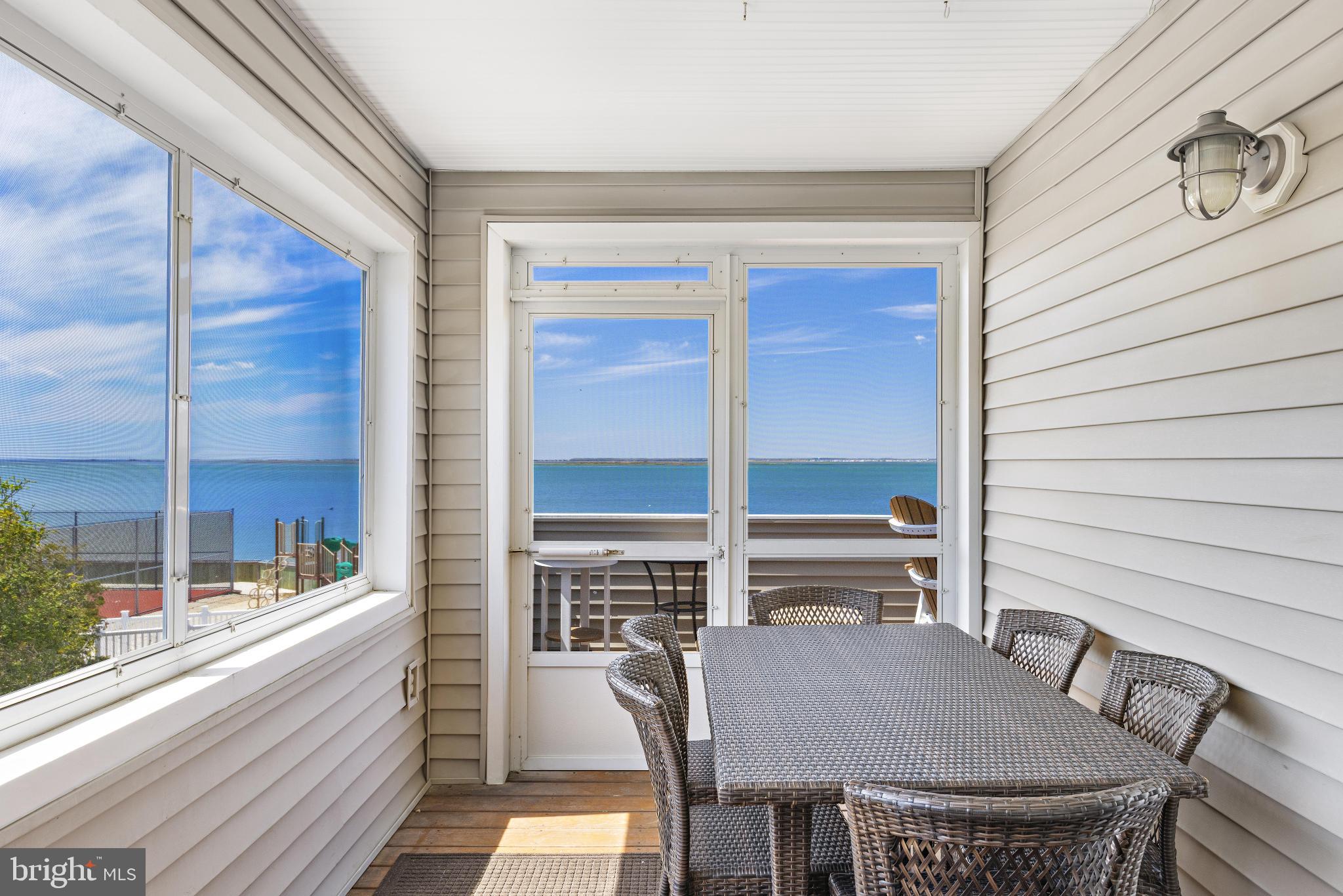 24 Joan Road Long Beach Township, NJ 08008 - Photo 24 of 55 a balcony view with a outdoor seating space