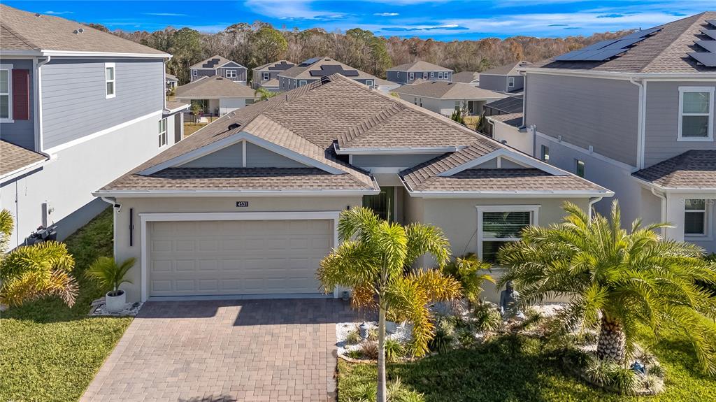 4531 Hillingdam Road Davenport, FL 33837 - Photo 32 of 36 a front view of a house with a yard