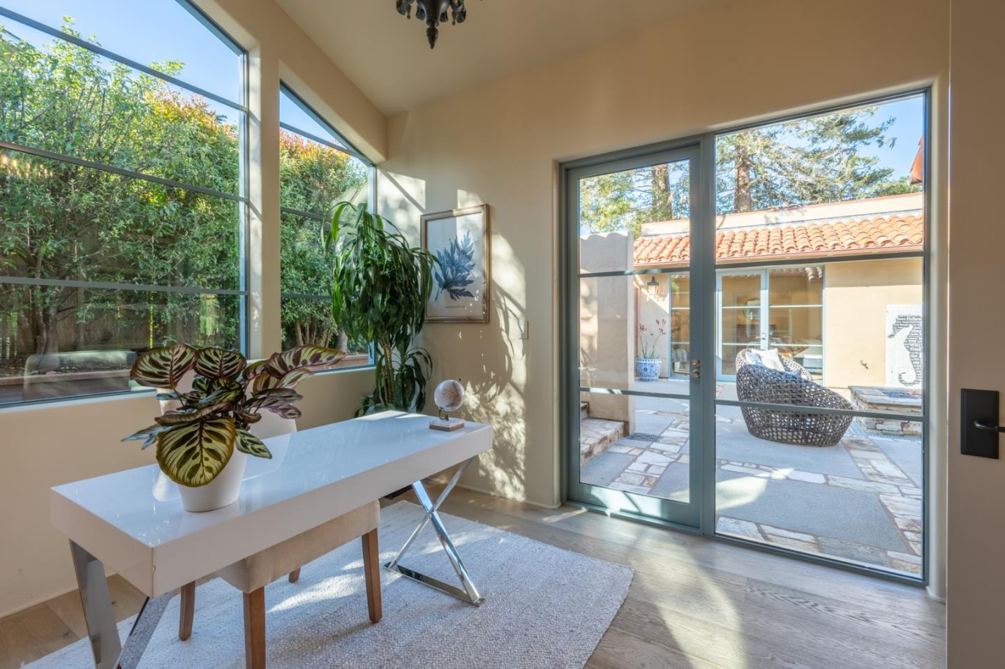 1014 Broncho Road Pebble Beach, CA 93953 - Photo 11 of 24 a view of a dining room and livingroom with furniture