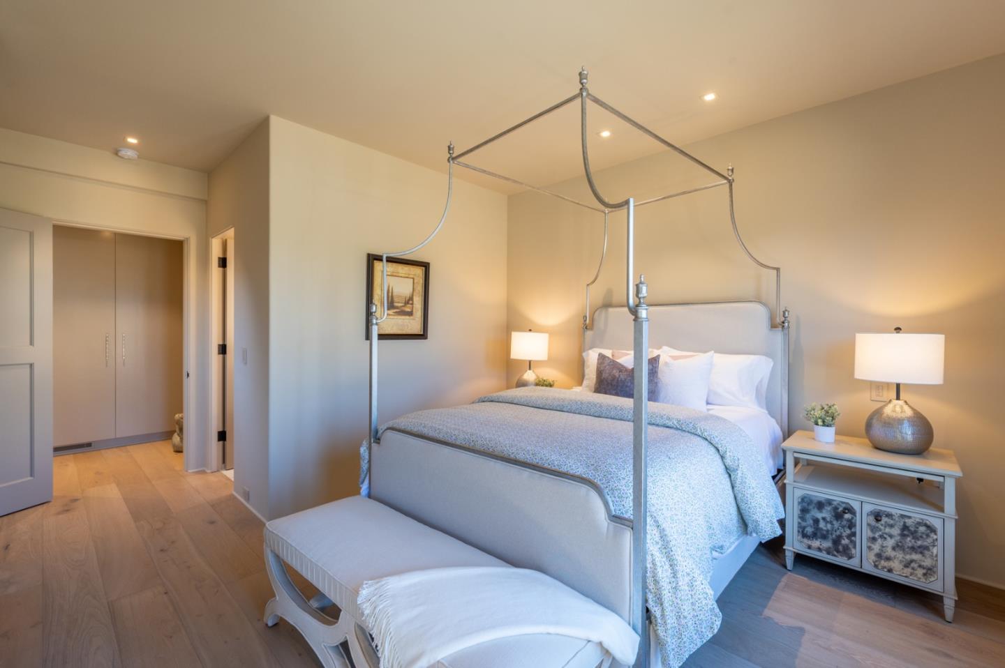 1014 Broncho Road Pebble Beach, CA 93953 - Photo 12 of 24 a bedroom with a bed and a walk in closet