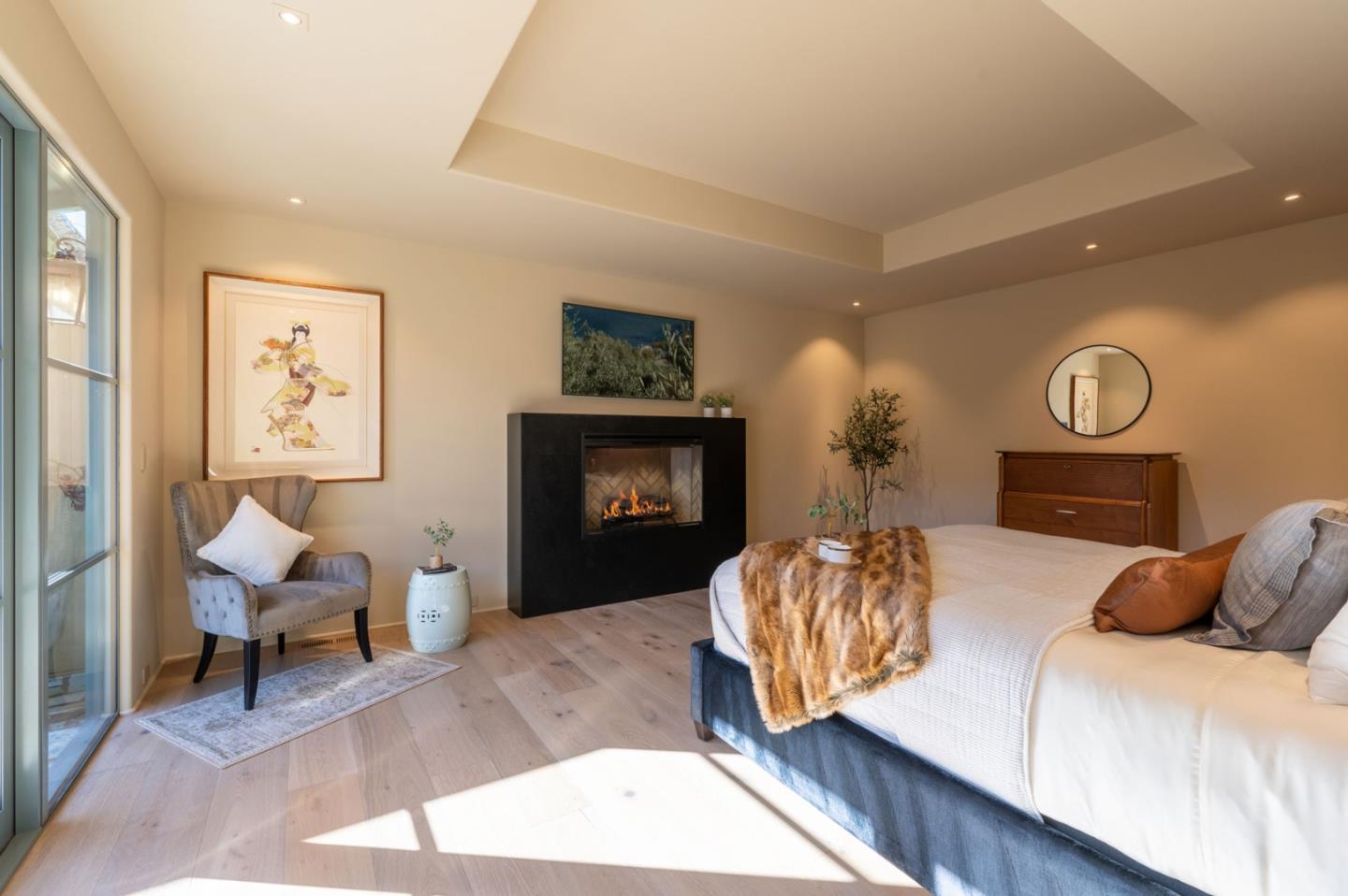 1014 Broncho Road Pebble Beach, CA 93953 - Photo 18 of 24 a bed room with a bed and a chair