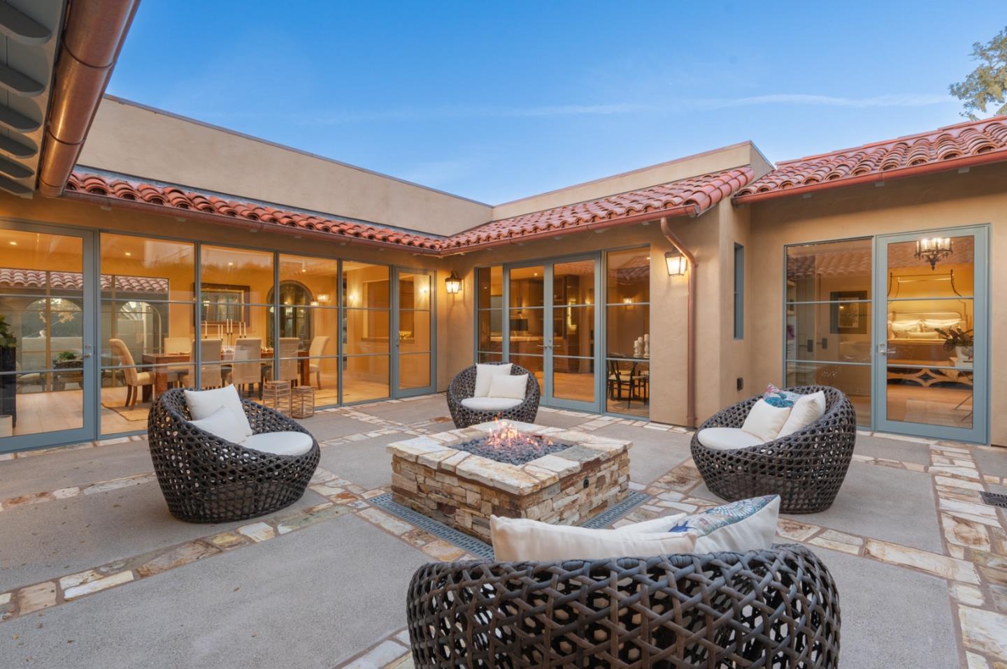 1014 Broncho Road Pebble Beach, CA 93953 - Photo 22 of 24 a living room with furniture large window and lamp