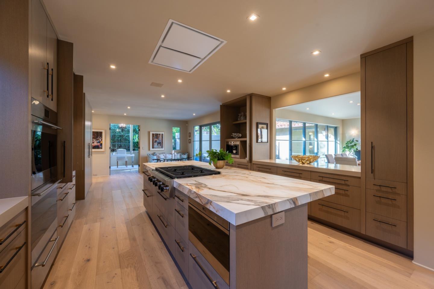 1014 Broncho Road Pebble Beach, CA 93953 - Photo 8 of 24 a kitchen with a stove and a sink