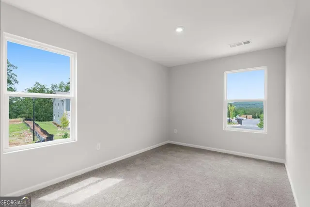 a view of an empty room and window