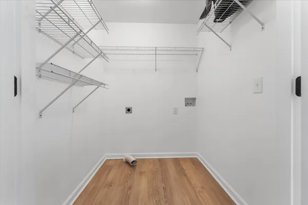 a view of small space with racks on the wall