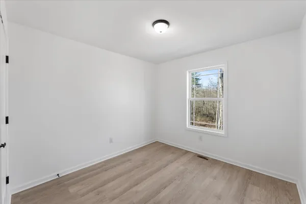 an empty room with a window