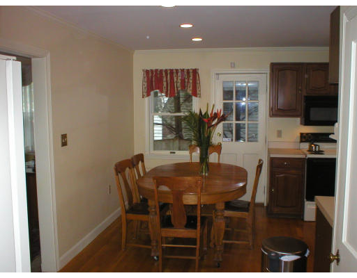 22 Bemis Road Newton, MA 02460 - Photo 4 of 14 a view of a dining room with furniture