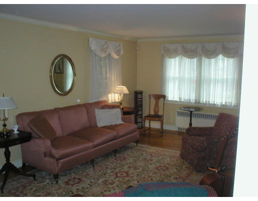 22 Bemis Road Newton, MA 02460 - Photo 8 of 14 a living room with furniture and a window