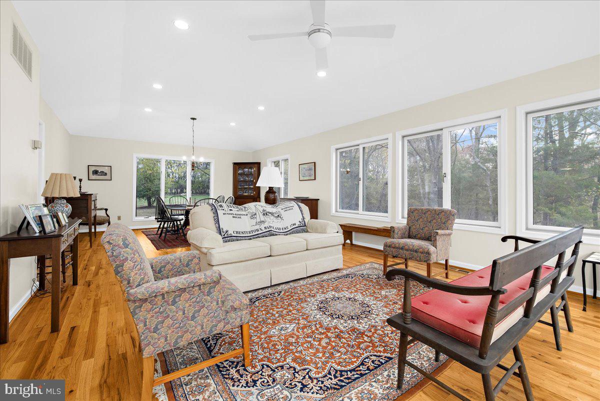 26889 Morgnec Road Chestertown, MD 21620 - Photo 13 of 32 a living room with furniture and a large window